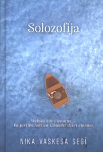 grāmatas N.Vaskesa Segī "Solozofija" vāki. Zīmējums - skats no augšas uz cilvēku laivā, apkārt ūdens.